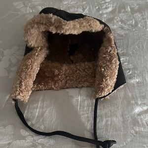 Black and Tan Shirling Aviator Hat. Reversible and sheepskin